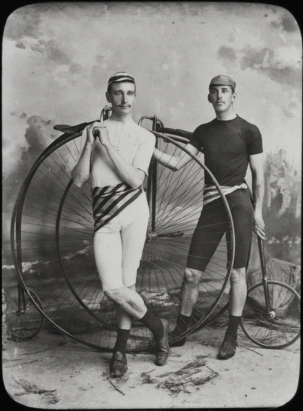 J. E. Fenlon and E. Mayes with penny-farthings