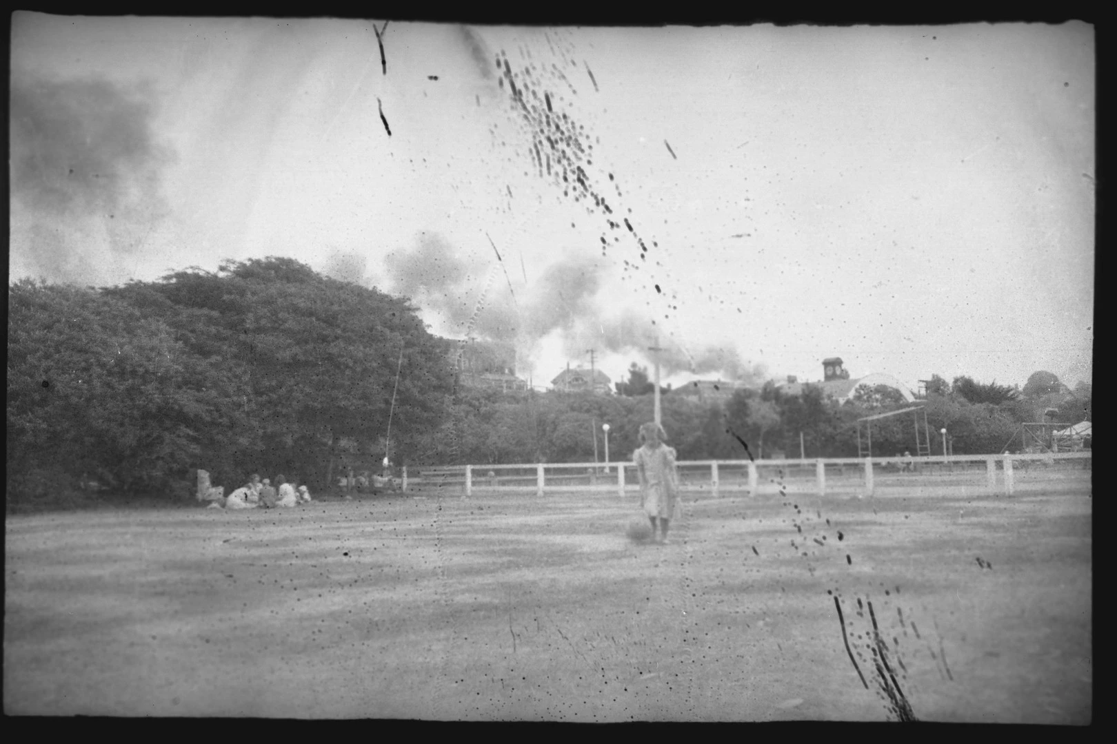 Child kicking a ball at Caroline Bay