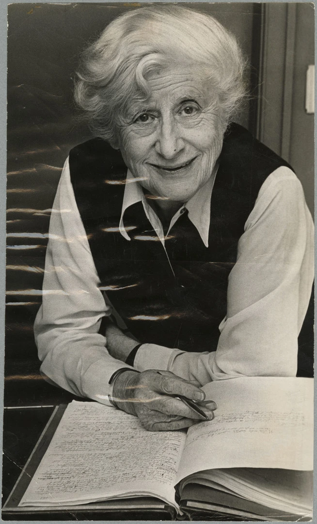 Ngaio Marsh writing in a book
