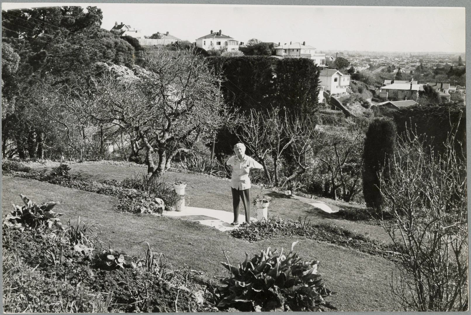 Ngaio Marsh standing in her garden