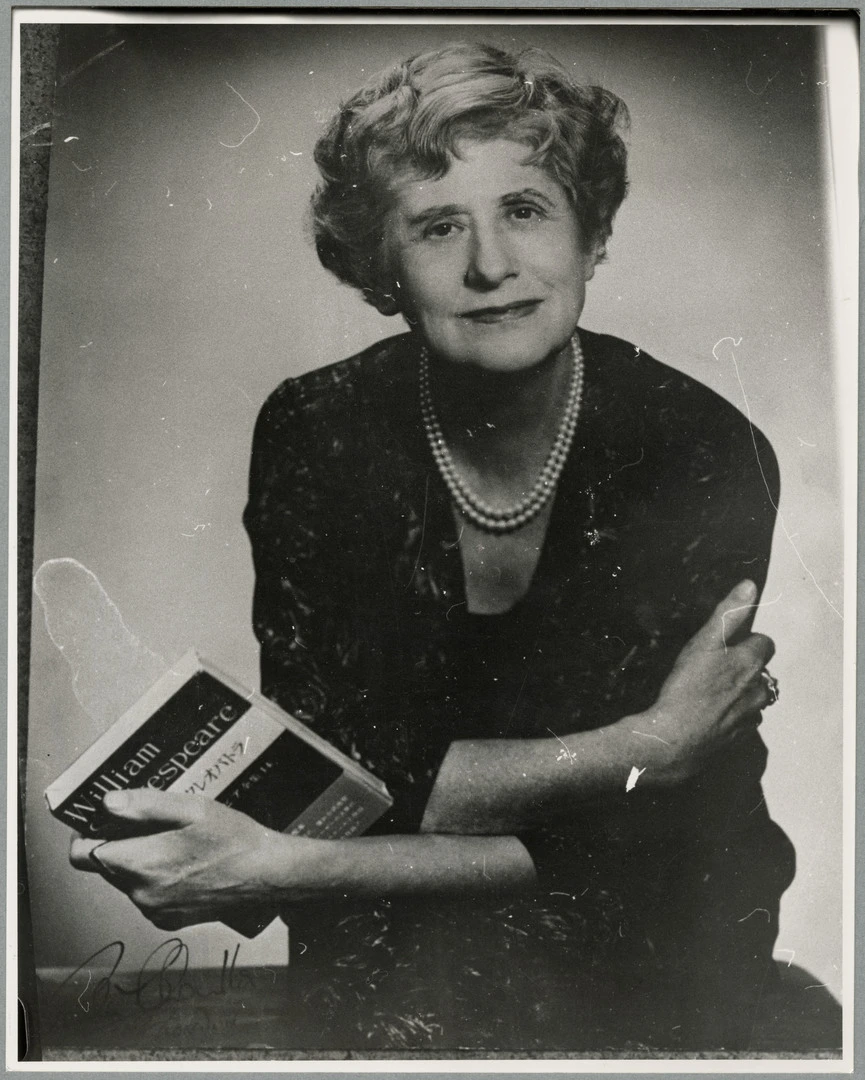 Ngaio Marsh holding a book