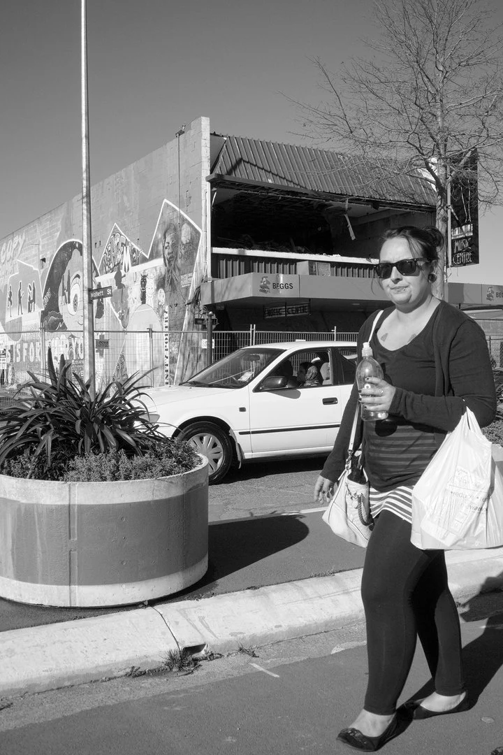 Pedestrian, car, and Beggs Music Centre