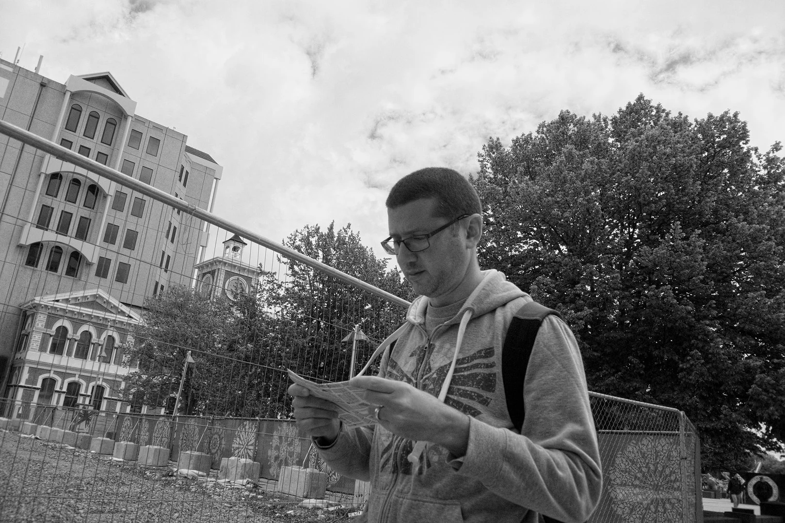 Reading a map on Colombo Street