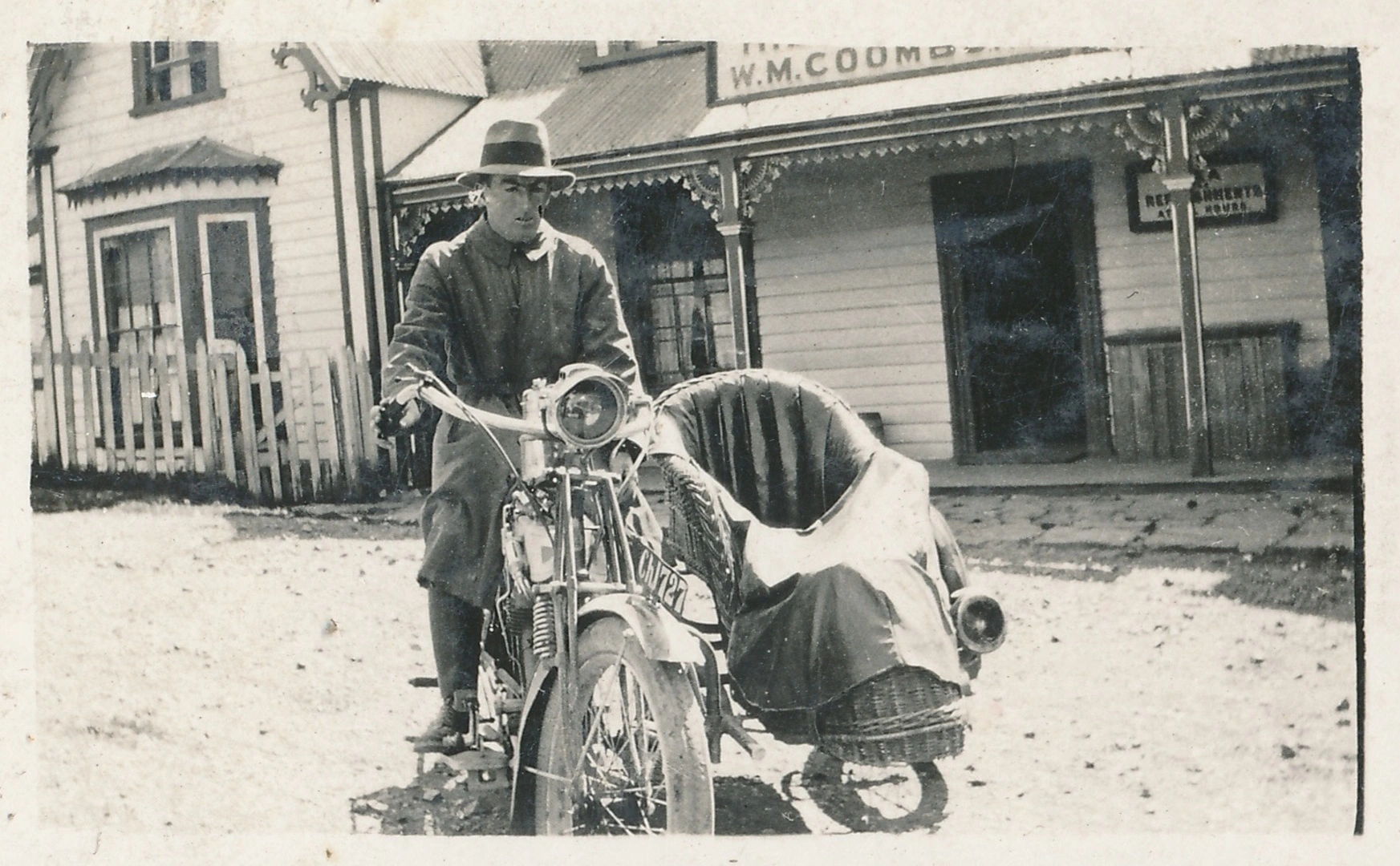 William Henry Pearce on a motorbike with sidecar