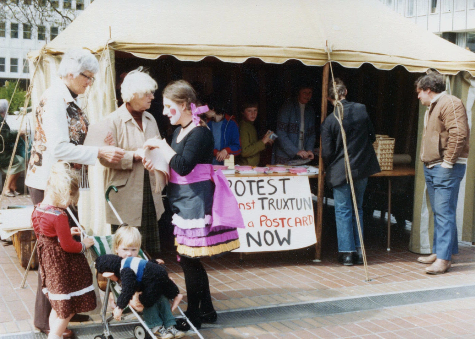 Send a protest postcard from the tent