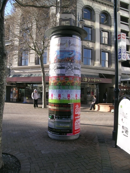 Poster bollard and Stewart Dawson building