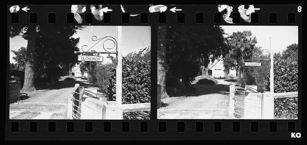 Sign a front gate of a house