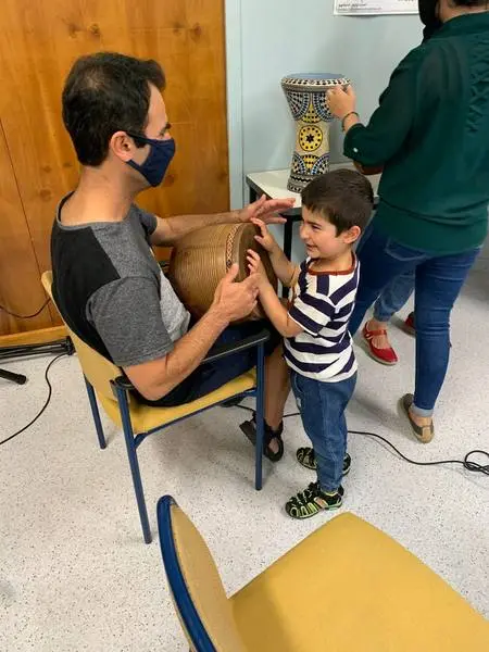 Father and son with Persian tonbak
