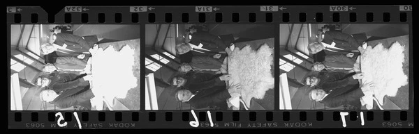 People with sheepskin rug