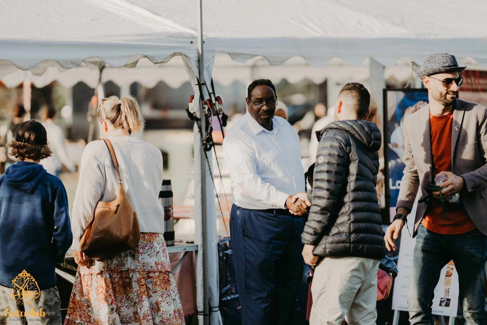Ahmed Tani shaking hands