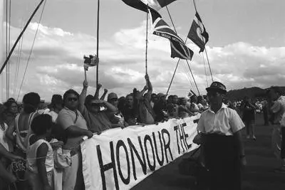 Protestors with 'Honour the Treaty' banner, Waitangi protests