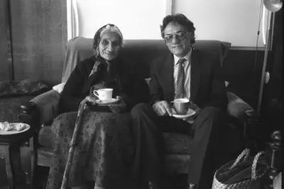 Whina Cooper at home with guest taking tea, Glen Innes