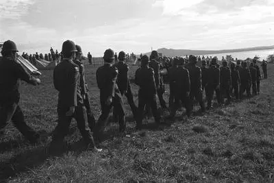 Police march on to site. Orakei Bastion Point Occupation