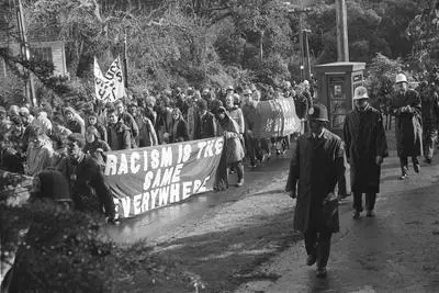 Protestors with banner 'Racism is the Same Everywhere' on Boston Road. Anti Springbok Tour protest