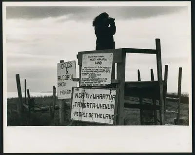 "Watching for the first signs of a police convoy". Ngati Whatua occupation of Bastion Point, Auckland, during land protest.