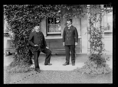 [Portrait of two male attendants on the veranda of the  Avondale Lunatic Asylum]