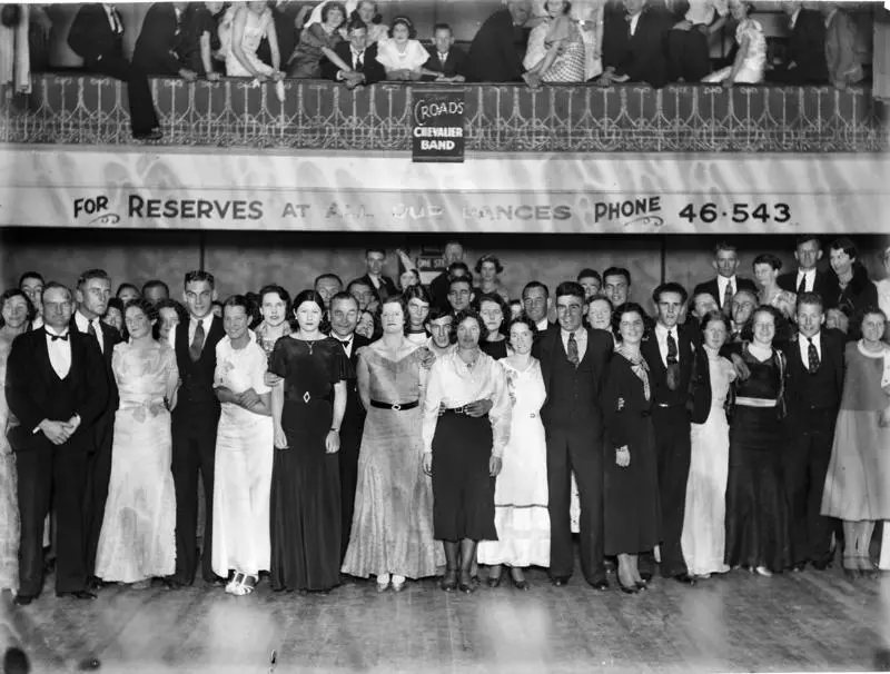 Group portrait at evening function in hall