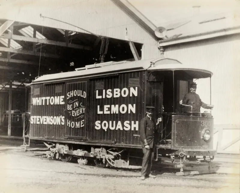 Parcel delivery tram 300 with two unidentified motormen