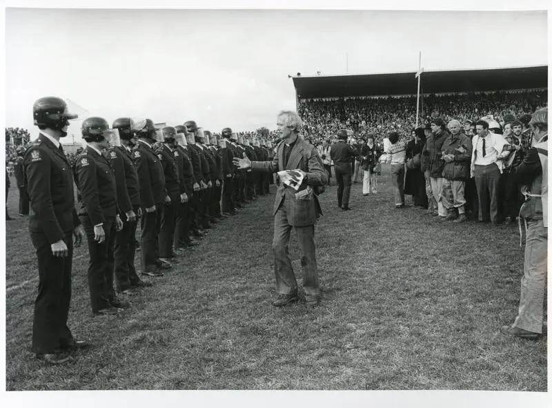 "Rev. George Armstrong (St. Johns College, Auckland) pleading with Riot Squad" - 1981 Springbok Tour