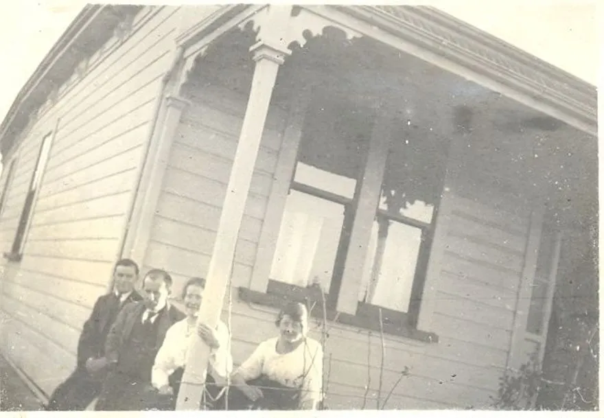 2 men and 2 women on verandah of a villa c1906.