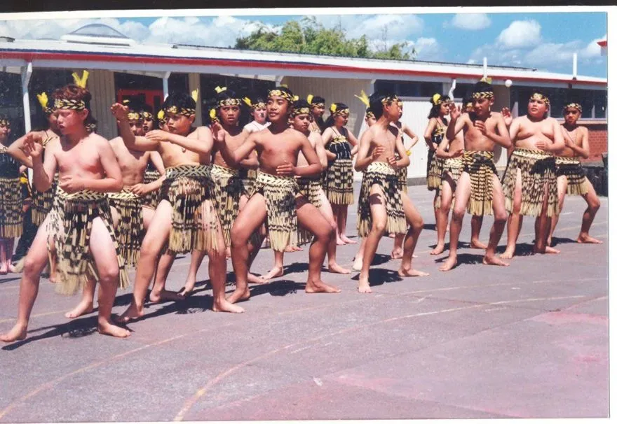 Taitoko Cultural Group performing, with boys at the front