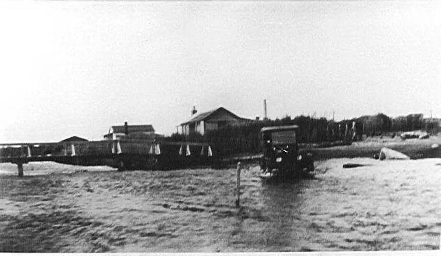 Car fording across Hokio Stream, 1920s