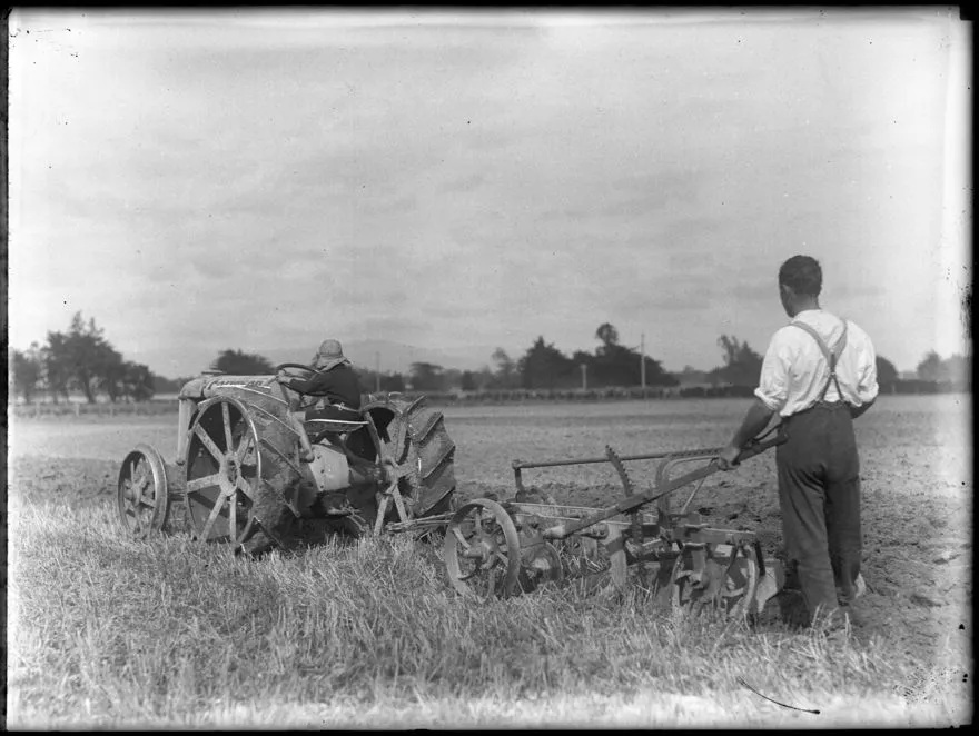 Fordson tractor pulling a plough