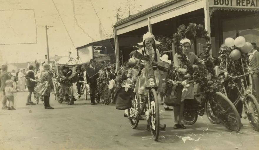Children with decorated bicycles in Royal Show procession
