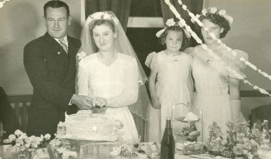 Cutting the cake at Barbara and Tom O'Grady's wedding