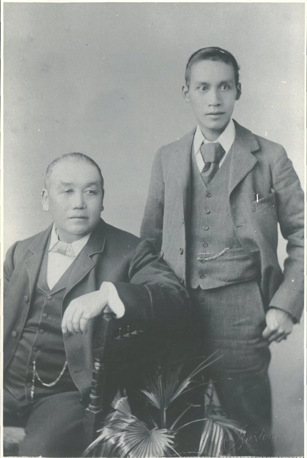 Kum Yok Sew Hoy (Charles) & Son Kum Poy