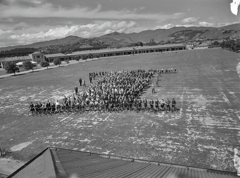 Education. School. Boys and Girls With Their Bicycles in an I Formation in the Grounds of an Unidentified School. Christchurch, Canterbury, New Zealand.