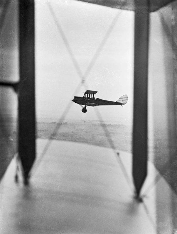 Aviation. Jean Batten, Famous New Zealand Aviatrix, flying her De Havilland DH60M Moth, G-AARB aircraft above Wigram Airfield, Christchurch, Canterbury, New Zealand.
