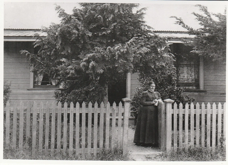 Portrait of Ellen Thompson, daughter of James (Fencible) and Margaret outside her cottage.