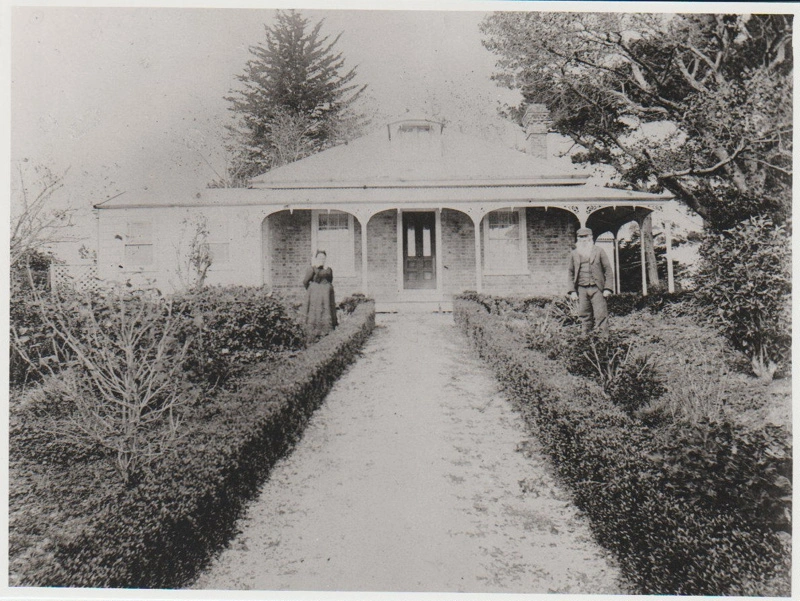 Thomas and Elizabeth McMillan standing in the gardens.