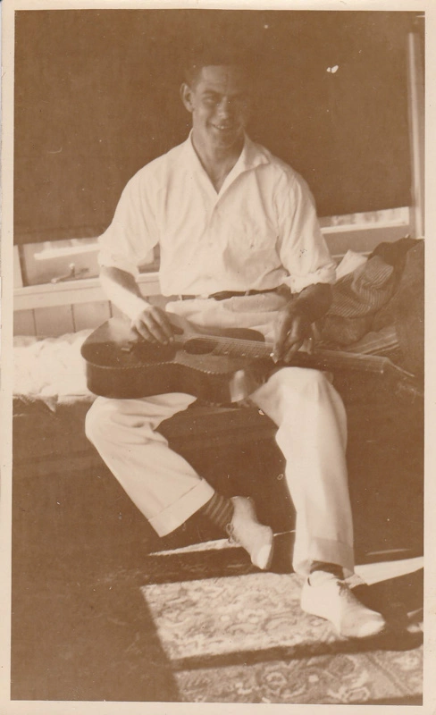 Geoffrey Fairfield playing his guitar.