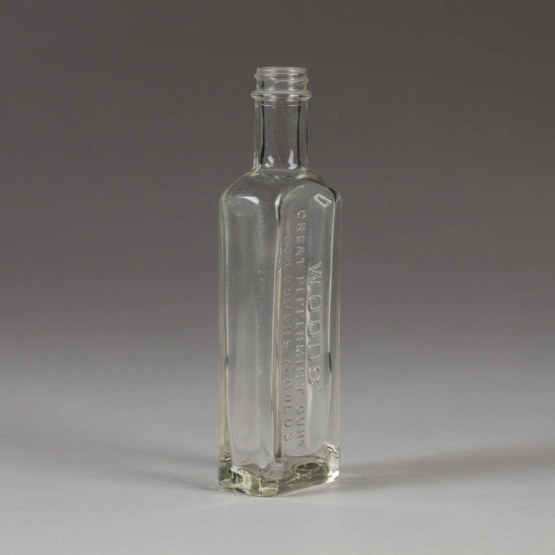 Bottle, 'Woods' Great Peppermint Cure'