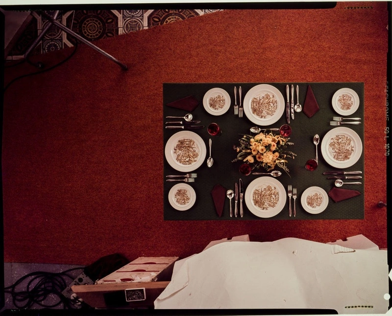 Transparency - Birdseye view of table setting display with 'Tradition' patterned crockery