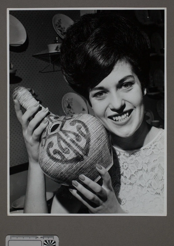 Photograph - Maori Beauty Queen poses with bottle
