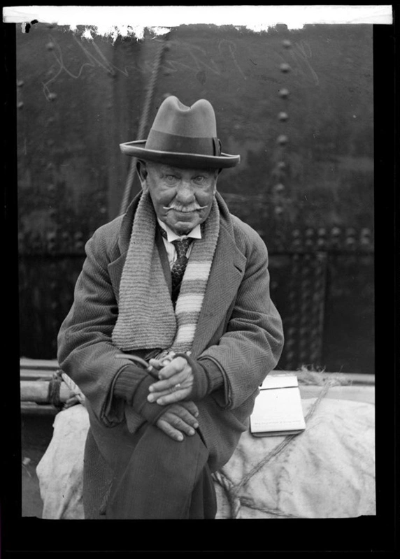 Man holding pipe, W. Pitcarthly.