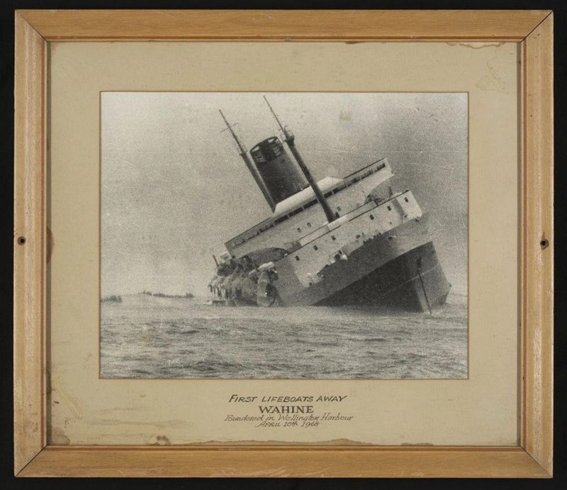 The first lifeboats leaving the 'Wahine' as she sunk on 10 April 1968. Glazed, wooden frame.