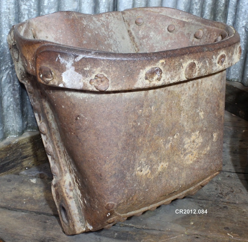 Bucket from a ladder dredge