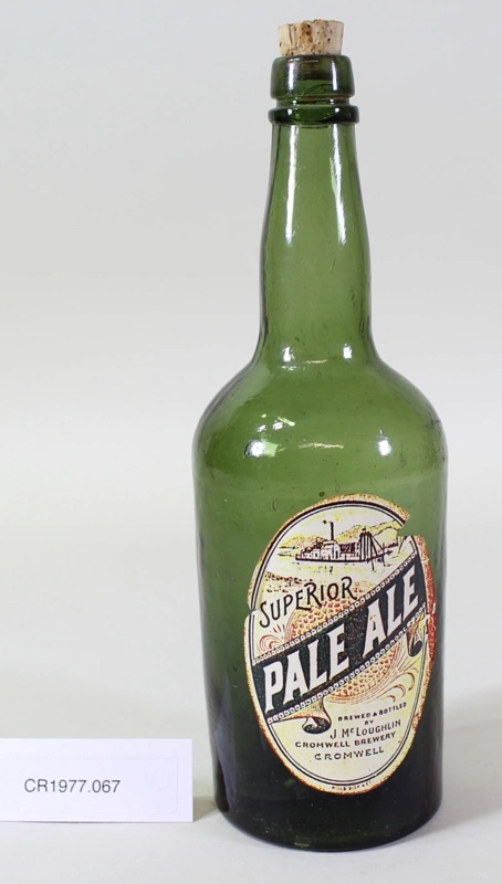 Dark green beer bottle & new cork