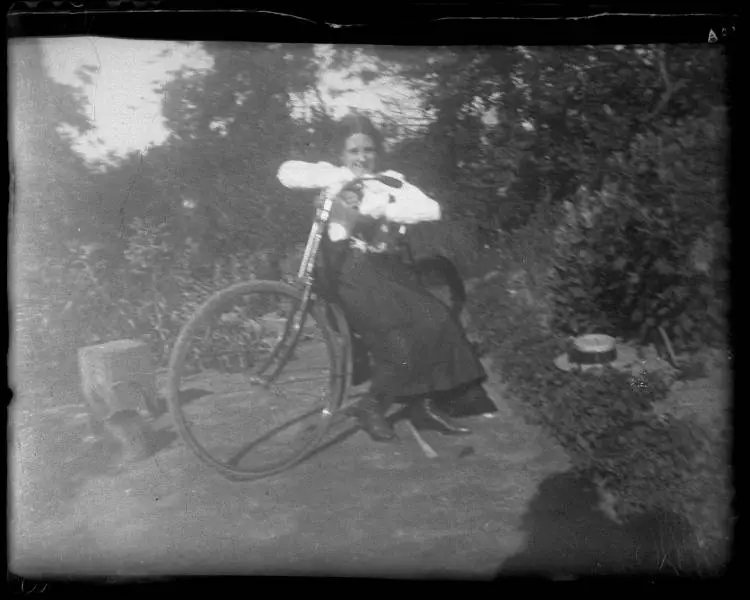 Girl in the garden of The Avenue, Karangahape Road, 1902