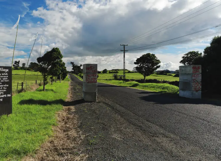 Protest signs, Ihumatao Quarry Road, Māngere, 2017