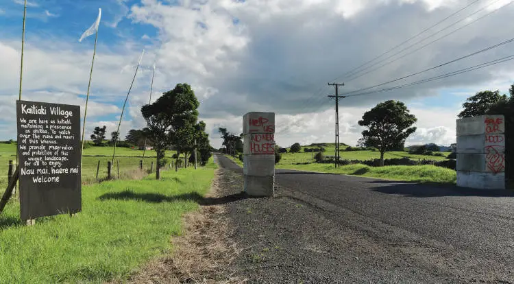 Protest signs, Ihumatao Quarry Road, Māngere, 2017