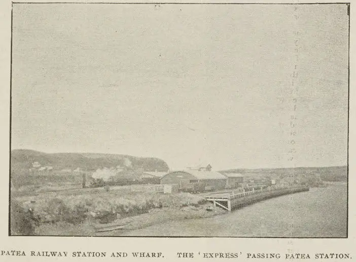 Patea railway station and wharf. The 'express' passing Patea station