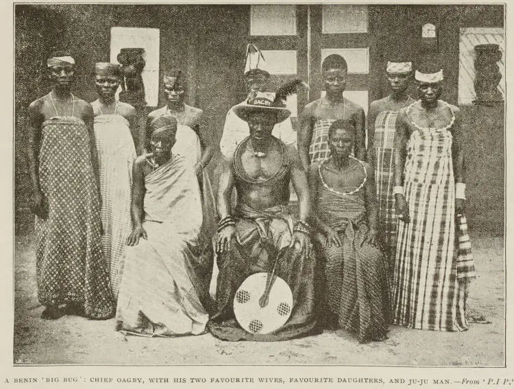 A Benin 'Big Bug': Chief Oagby, with his two favourite wives, favourite daughters, and Ju-Ju man