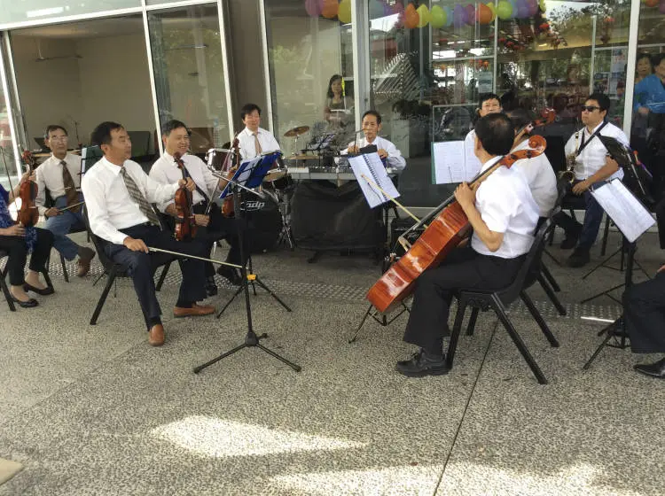 Onehunga Chinese Association members performing outside Onehunga Library.