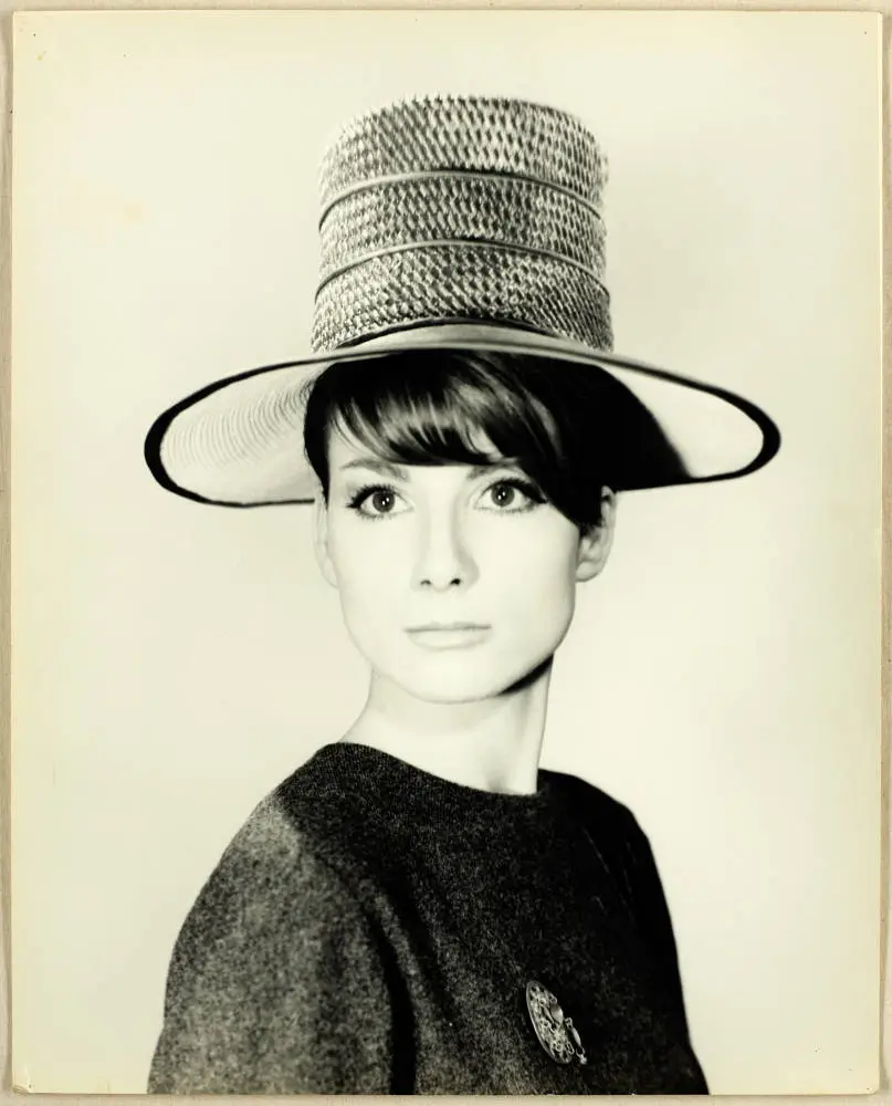 Susanna Fraser wearing a tall hat, 1960s