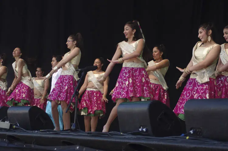 Groups doing Bollywood dancing.